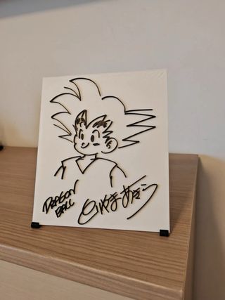Placa en relieve de Goku firmado Akira Toriyama