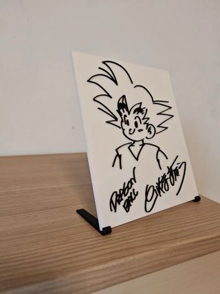 Placa en relieve de Goku firmado Akira Toriyama