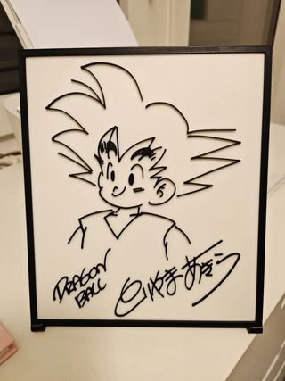 Placa en relieve de Goku firmado Akira Toriyama