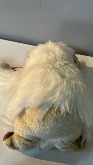 Mono blanco de peluche para colgar