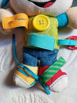 Fisher price perrito visteme y aprende 