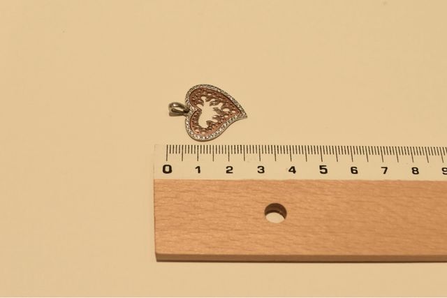 COLGANTE BICOLOR DE ORO 18KL/3.0Gr