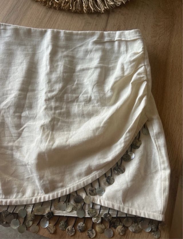 gonna da donna incrociata con perline al fondo