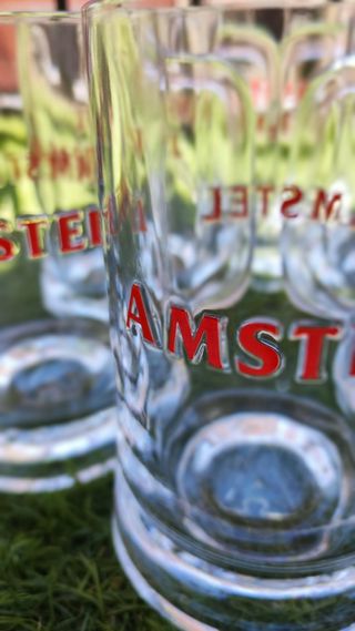 Lote 6 jarras Amstel de medio litro