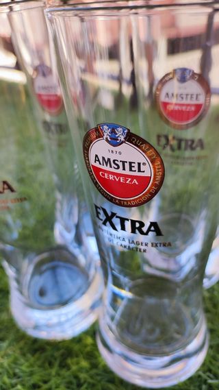 Lote de vasos altos Amstel Extra