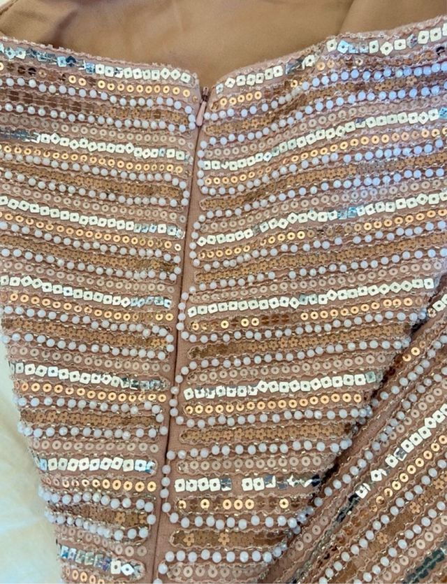 Mini falda de lentejuelas y perlas