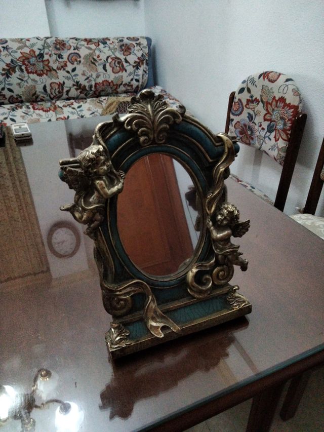 Marco de espejo con angeles