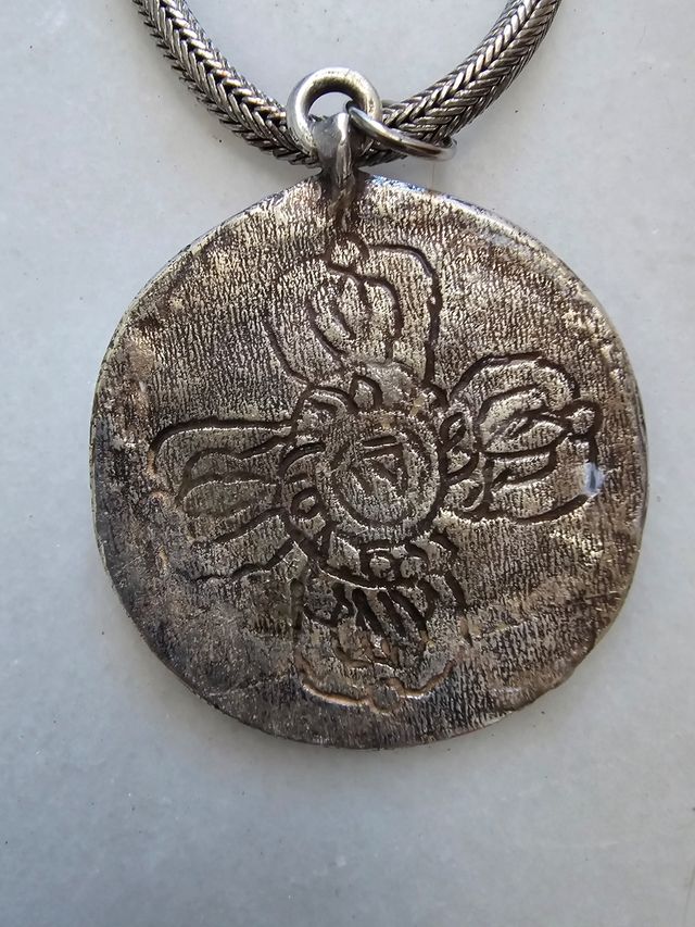 Catena in argento e medaglione azteco