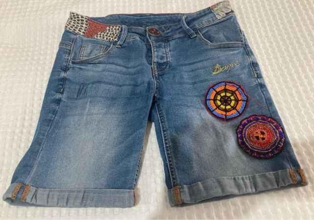 Short corto desigual