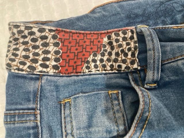 Short corto desigual