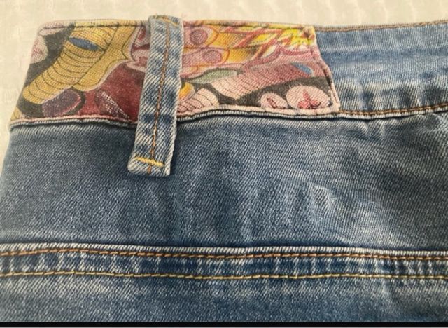 Short corto desigual