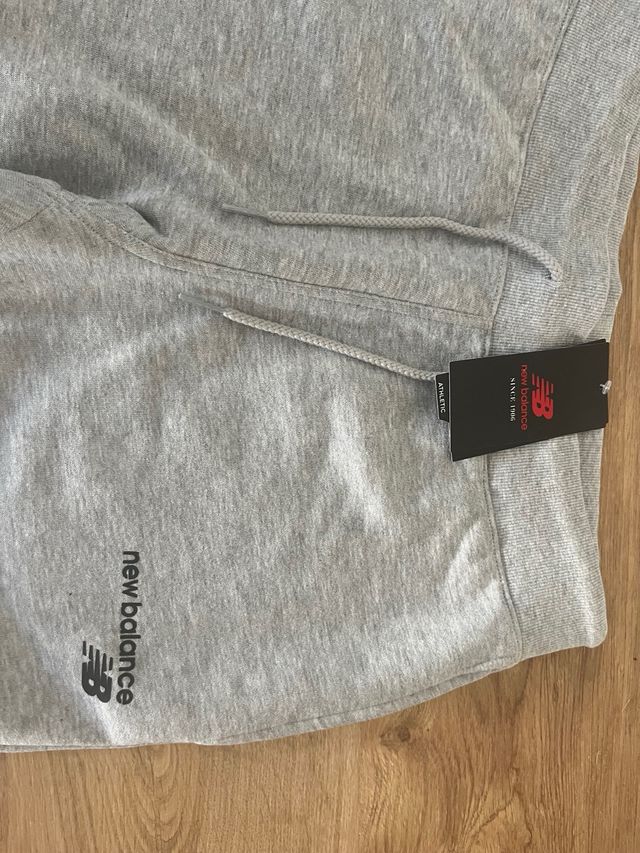 Pantalon largo gris New Balance Talla L