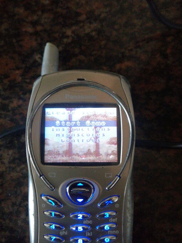 Móvil Panasonic con cargador