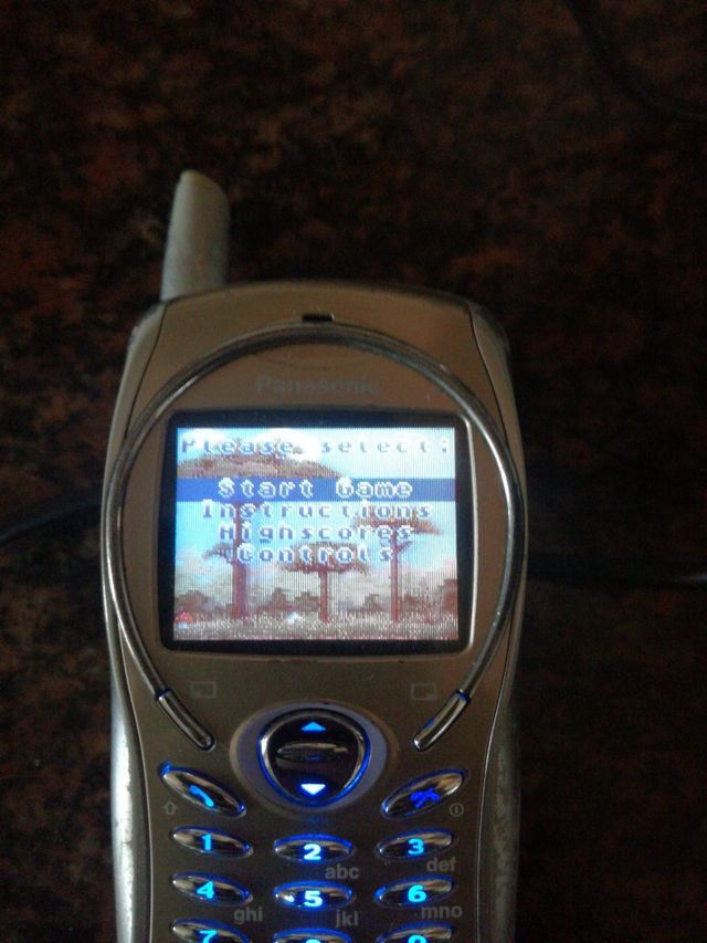 Móvil Panasonic con cargador