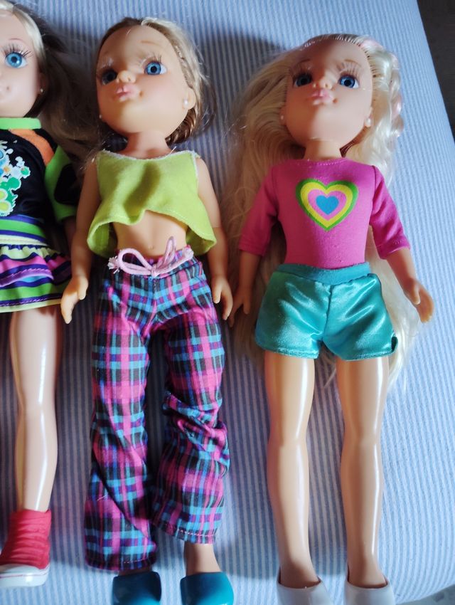 5 muñecas Nancy