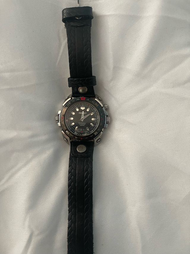 Reloj de cuarzo de cuero y acero