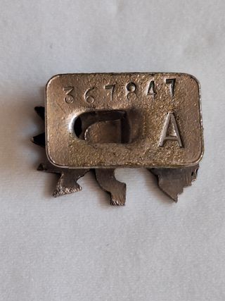 Insignia militante de Falange numerada