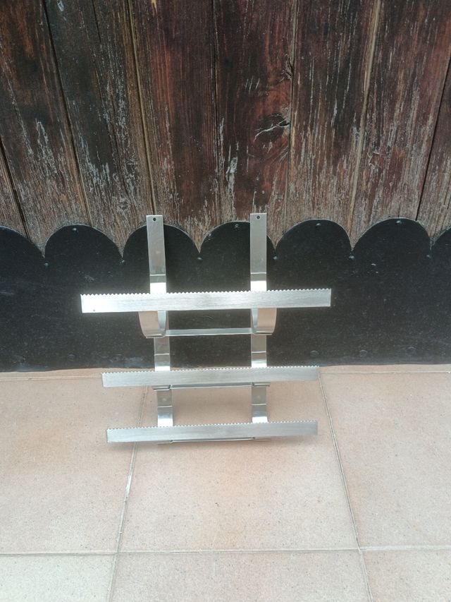 Utensilio de Acero para rollos de cocina