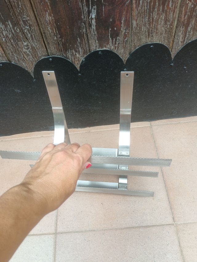 Utensilio de Acero para rollos de cocina