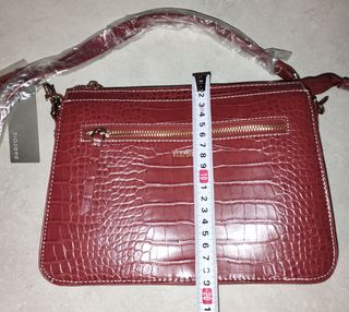 Bolso color teja con asa ajustable