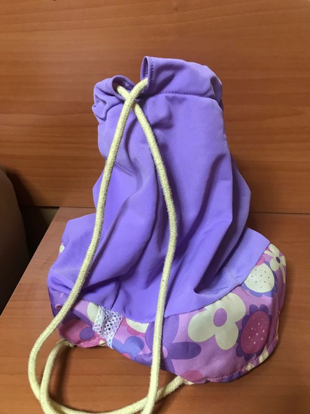 MOCHILA CON MUÑECA DE TRAPO