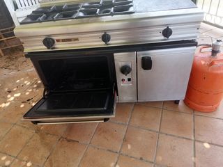 cocina a gas 3 fuegos y horno funciona perfecto