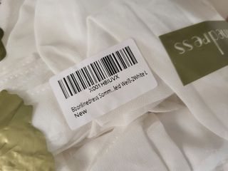 Vestido blanco gasa y encaje vuelo