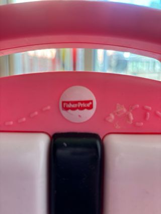 Gimnasio para bebe marca Fisherprice con piano