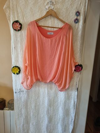 Blusa de seda.