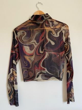 Camisa semitranspatente estampado retro