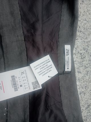 Pantalón corto tachas zara 