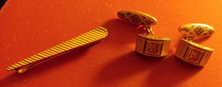 Gemelos,alfiler,monedas, mechero,abridor,colgante