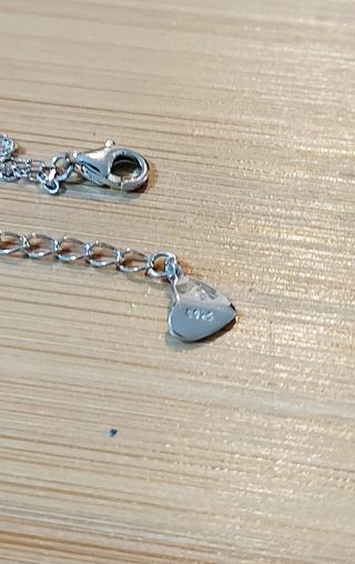 Pulsera doble cadena plata con estreĺlas