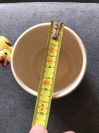 Taza silbante de loza inglesa