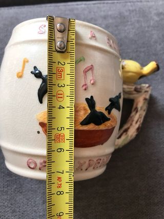 Taza silbante de loza inglesa