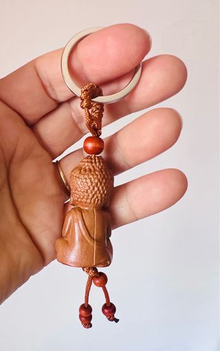 Porta chave Buda em madeira.