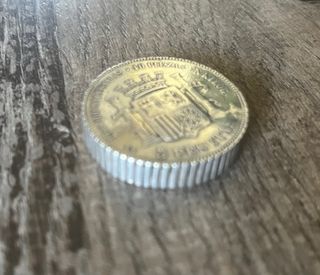 Moneda mechero de plata