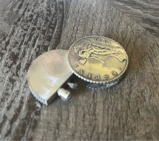 Moneda mechero de plata