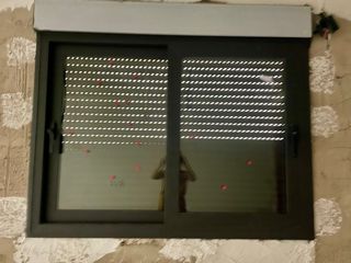 Ventana con 2 hojas corredera-aluminio- mosquitera