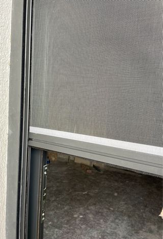 Puerta abatible dos hojas mosquitera