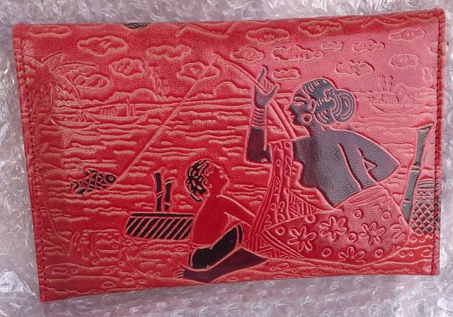 Monedero Kane-m piel con grabados