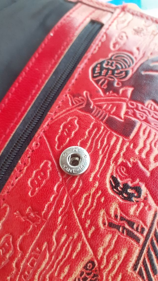 Monedero Kane-m piel con grabados