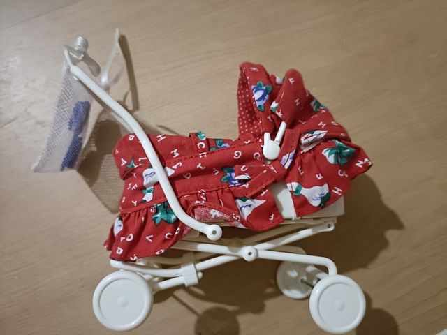 Carrito, portabebé y muñeca Steffi Love en caja 