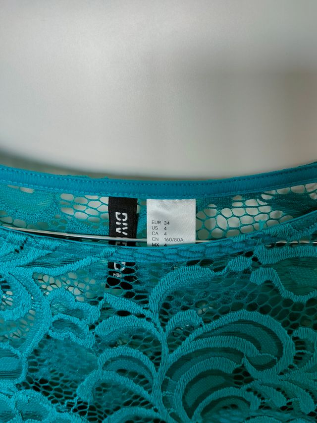 Miniabito pizzo verde