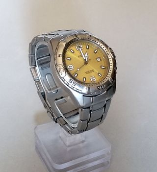Festina. cuarzo, esfera amarillo.