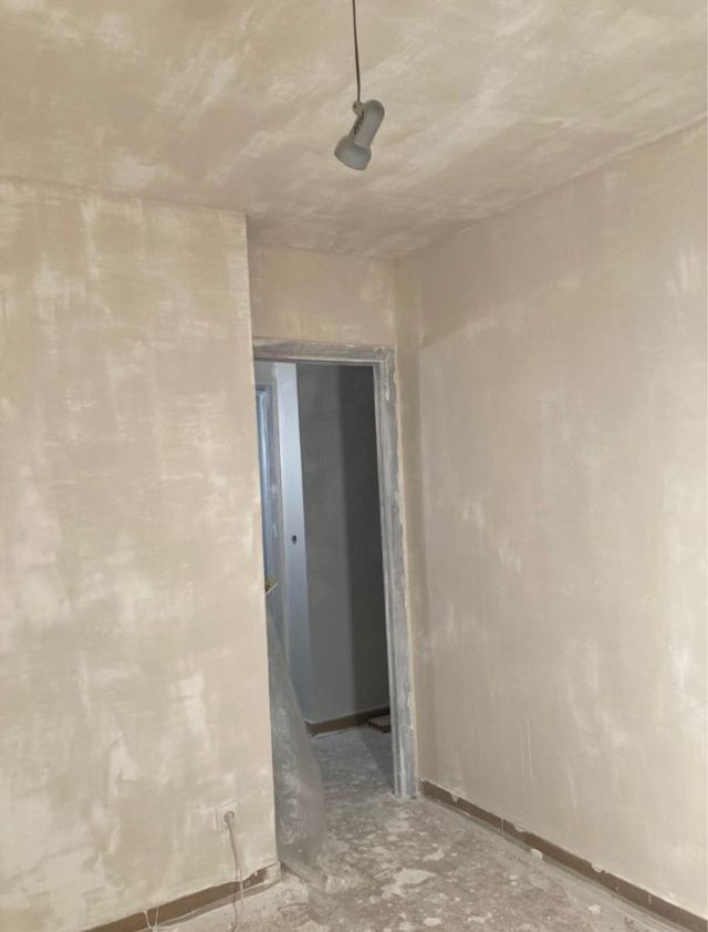 Alisado de pared gotele enlucido