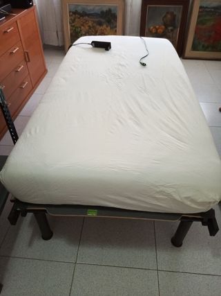 Cama para ancianos con barandilla