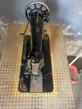 Maquina de coser singer