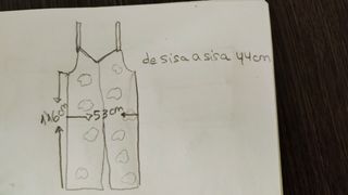 Mono largo blanco con flores