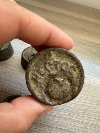 Antiguas pesas de básculas de principios de siglo